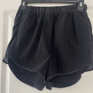 Black lululemon running shorts.